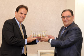 Member of the Milli Majlis, Chingiz Asadullayev, presenting a souvenir to his colleague from the UK, Mark Field