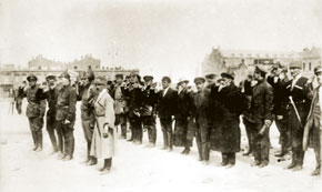 Review of the units of the 11th Army. Members of the Azerbaijan Revolutionary Committee: T. Smilga (third in the first row), second row left to right: G. K .Ordjonikidze, Ch. Ildirim, M. K. Levondovski, S. M. Kirov, F. Shlemova